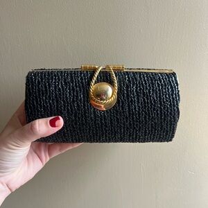 Elegant Black Clutch with Gold Accent